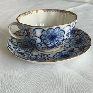 Vintage Lomonosov Porcelain Cup and Saucer set. Hand decorated made in Russia
